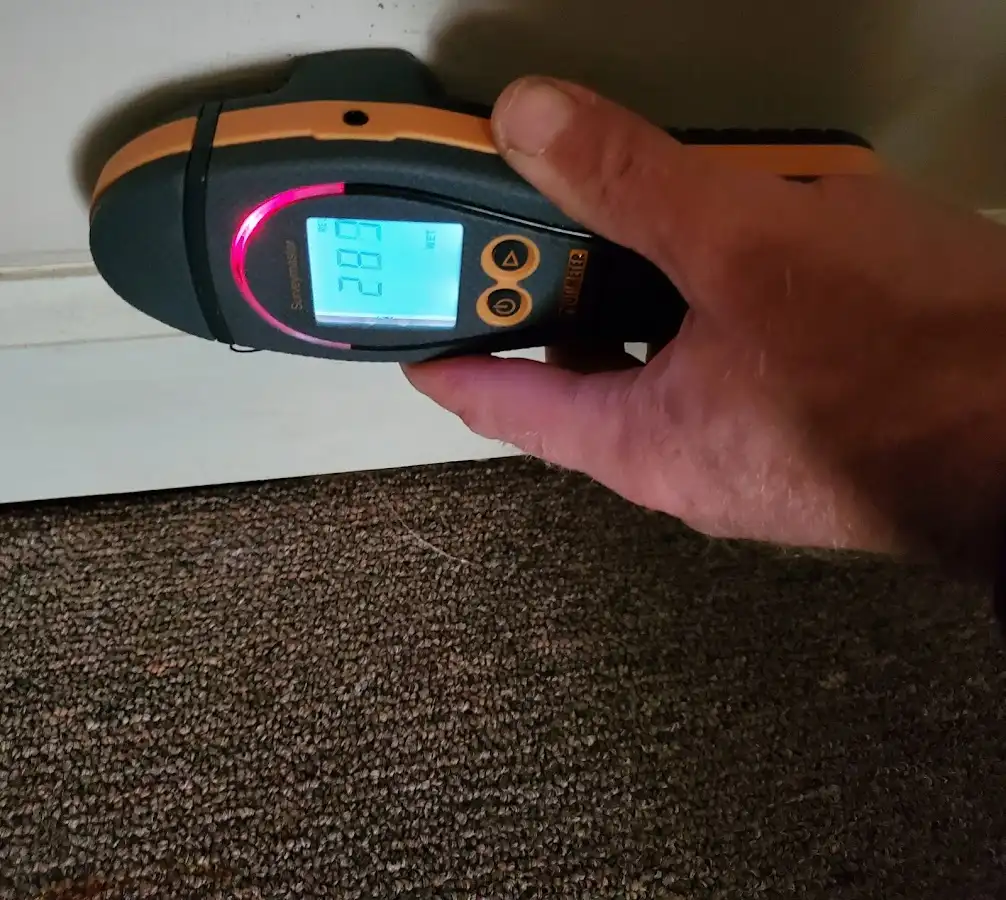 Moisture detection at baseboard during Storm Damage Restoration in Glastonbury